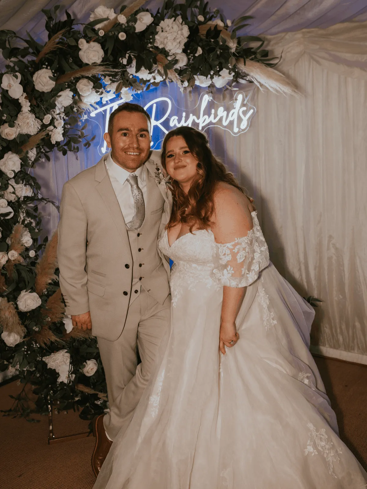 Crescent Moon Floral Backdrop styled at a wedding